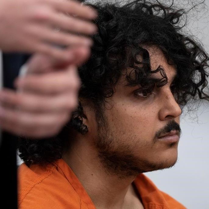 Man wanted in New York killing pleads not guilty to charges stemming from 2 stabbings in Arizona